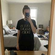 Love Is As Love Does Graphic T-Shirt - Black Cotton Tee with Gold Typography