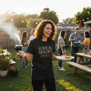 Love Is As Love Does Graphic T-Shirt - Black Cotton Tee with Gold Typography